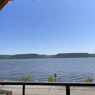 a view of a lake from a deck