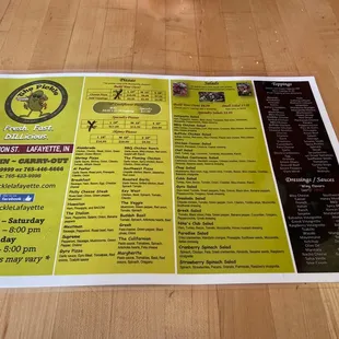 a menu on a wooden table