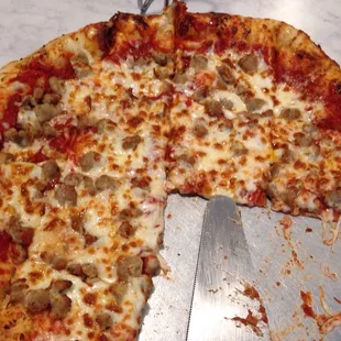 Pizza special: one topping deal. I chose sausage. All around a winner! Great dough, good cheese, good sauce.