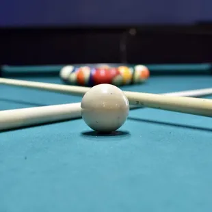 a close up of a pool table