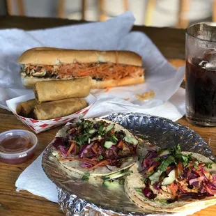 Banh Mi tacos, sandwich, and egg rolls