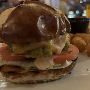 Fried Avocado sandwich with tots. Yum.