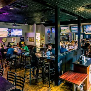 a crowd of people in a sports bar