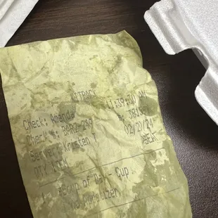 Someone else&apos;s receipt under salad