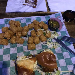 What is left of my pork sandwich and tater tots