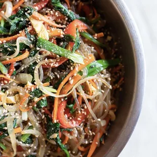 a bowl of stir fried vegetables