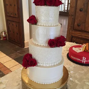 Beautiful wedding cake with various flavors (red velvet, vanilla, italian coconut). Delicious per usual!