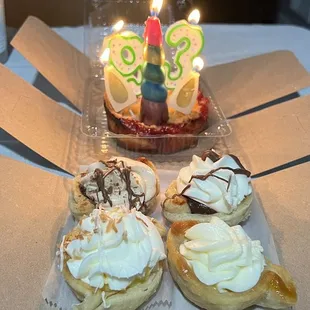 Peanut butter pie, Key Lime Pie, wild berry tart, and coconut pie we got for our friends birthday! Ignore the unicorn horns haha.
