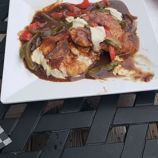 Jack Daniel's chicken Fiesta(chicken,sauteed onions&amp;peppers, cheese &amp; jack daniel brown sauce)fries &amp; side salad not pictured.