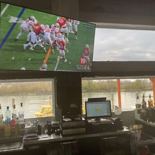 Inside bar area with view of the Huron river
