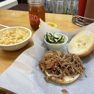 Pulled BBQ sandwich, house made pickles, (perfect!) coleslaw, pepper vinegar (a MUST), Mac and cheese.