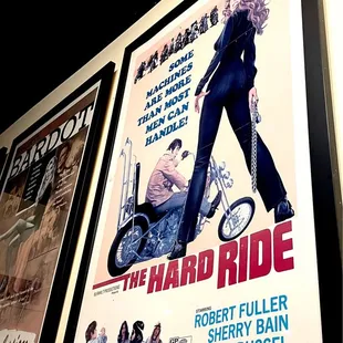 Several posters from older films adorn the walls in the place.