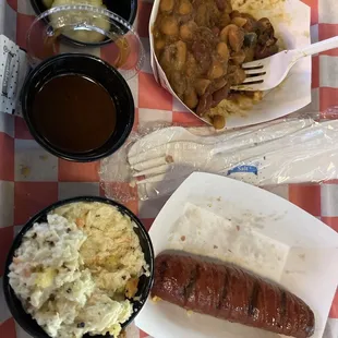 Sausage, coleslaw, beans.