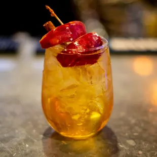 a drink in a glass on a table