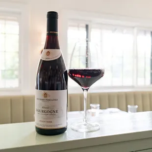 A bottle of red wine.