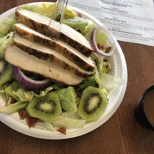Kiwi pineapple chicken salad  Solid portions  7.49$ Great place for lunch in EC