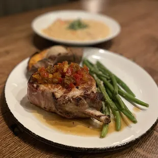*PORK CHOP  green beans, baked sweet potato brülée, bourbon glaze