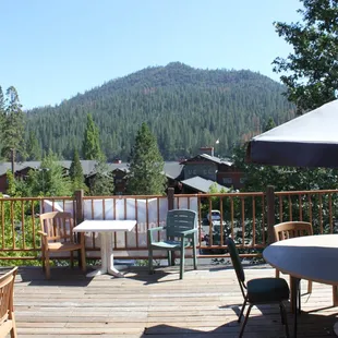 a view of the mountains from the deck