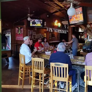 people sitting at the bar