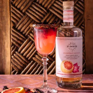 Paloma Querida: Our very own version of the Paloma, with hibiscus-pomegranate shrub, grapefruit soda and Hibiscus - Grapefruit Tequila.