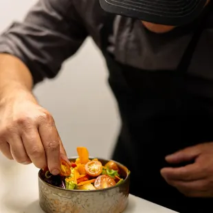 a chef preparing a dish