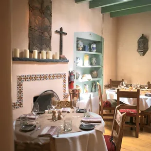 a dining room with a fireplace