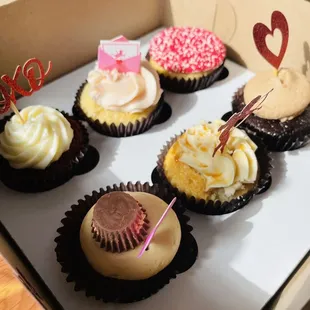 Back to right, front to right: Red Velvet, Sweet Pink Vanilla, Happy BIrthday, Reese&apos;s Pieces Cup; Dulce de leche; Chocolate Melt