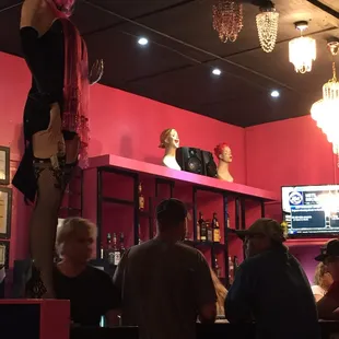 a mannequin in a bar