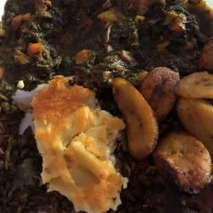Legume, plantains, black mushroom rice and Haitian macaroni with cheese