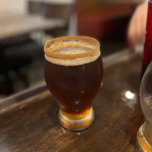 a pint and a glass of coffee