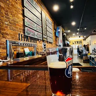 a pint of beer on the bar