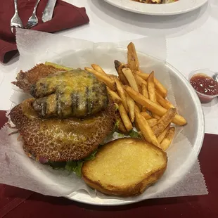 Cheese Burger &amp; French Fries. (In the back) Pulled Pork Lasagna.