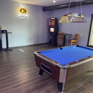 a pool table in a game room
