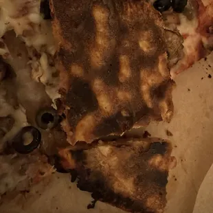 Burned pizza.