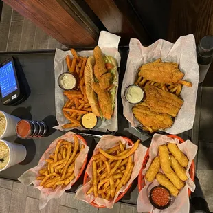 catfish po boy with fries, Fried Catfish Basket, mozzarella sticks, rice, Cajun Fries