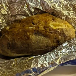 If you want to eat lighter, The Pit potatoes are piping hot and tender