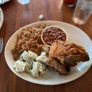 Two meat: fried chicken, chopped pork, potato salad, and baked bean. All was good minus the baked beans.