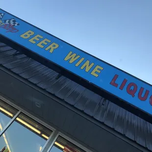 a sign for beer wine liquor