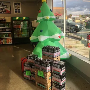 a christmas tree made out of soda cans