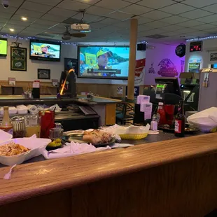 a bar with food on the counter