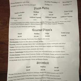a pizza menu on a table
