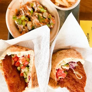 Shnitzel Pita Sandwiches, Cauliflower Florets and fries.