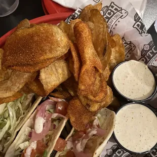 Mahi Mahi tacos with house chips.