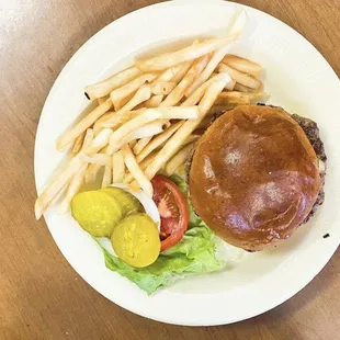 a hamburger and french fries on a plate