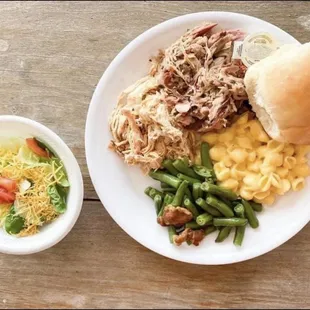 a plate of food and a bowl of salad
