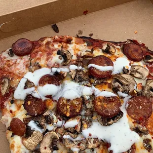 a slice of pizza with toppings