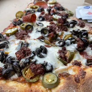 a slice of pizza in a box