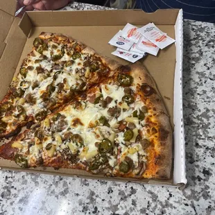 Linguicia, pepperoni, beef, mushrooms, pineapple, jalapeños, xtra cheese.