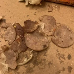 I picked the linguica off because it had an old meat taste. Isn't not supposed to look and taste like this! So gross