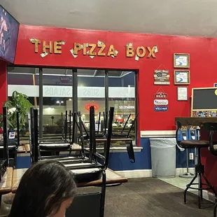 a little girl sitting at a table